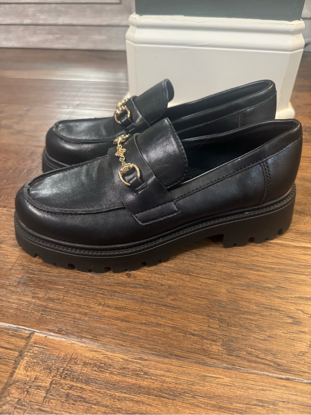Steve Madden Black Leather Lug-Sole Loafers with Gold Chain